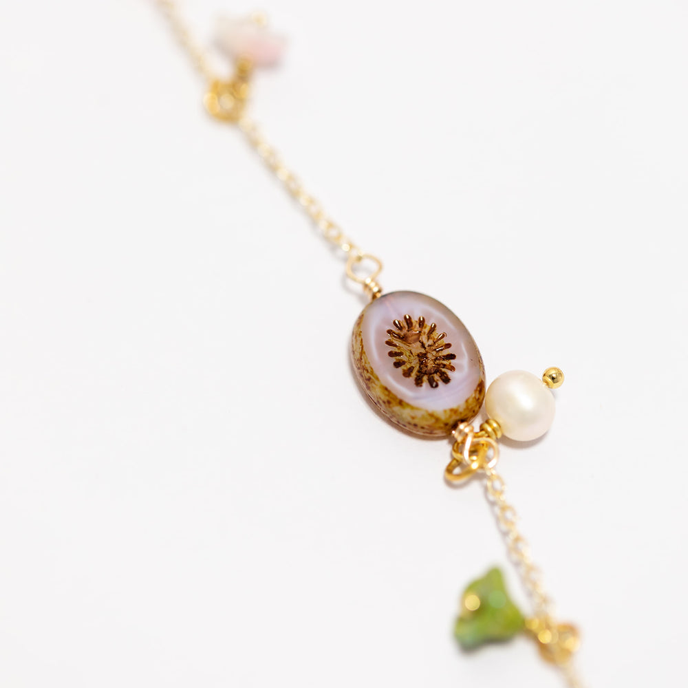 
                  
                    Semi precious stone Charm Necklace with Pearl Drop
                  
                