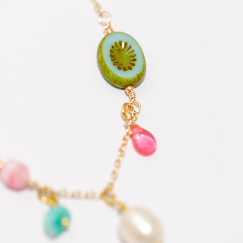 
                  
                    Semi precious stone Charm Necklace with Pearl Drop
                  
                