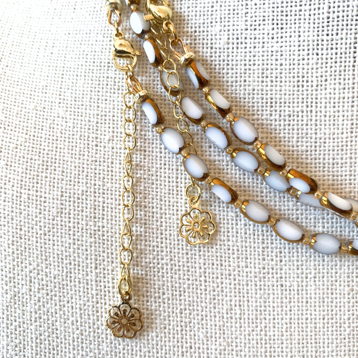 White chiselled glass bead necklace